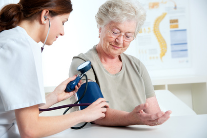 internist measuring blood pressure